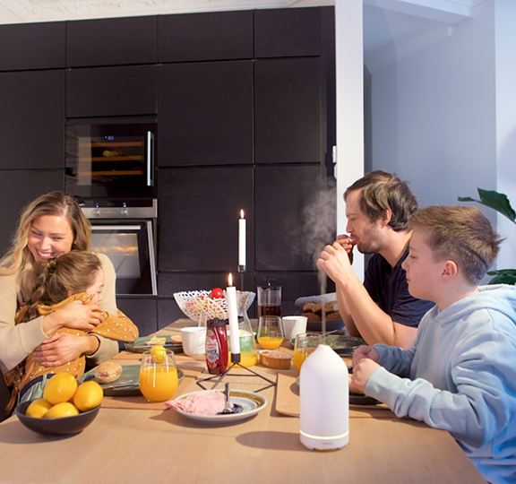 Family checking home cameras on a smartphone while away