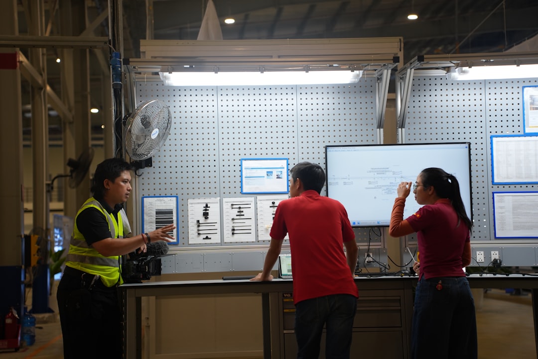 FoxSecur technicians working together installing security equipment