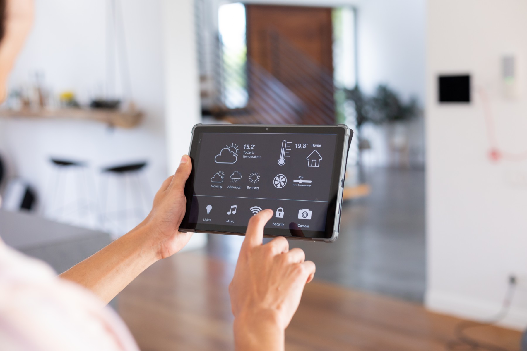 Business owner reviewing security controls on a tablet